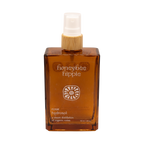 A brown rectangular spray bottle labeled "Honeybee Hippie rose hydrosol" with white text, sun-like symbols, a white spray nozzle, and a wooden collar—ideal as a natural toner or skin refresher.