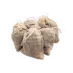 Four small beige muslin drawstring bags of Honeybee Hippie postpartum herbal sitz bath are grouped against a white background. Perfect for postpartum recovery, each bag contains a soothing herbal blend.