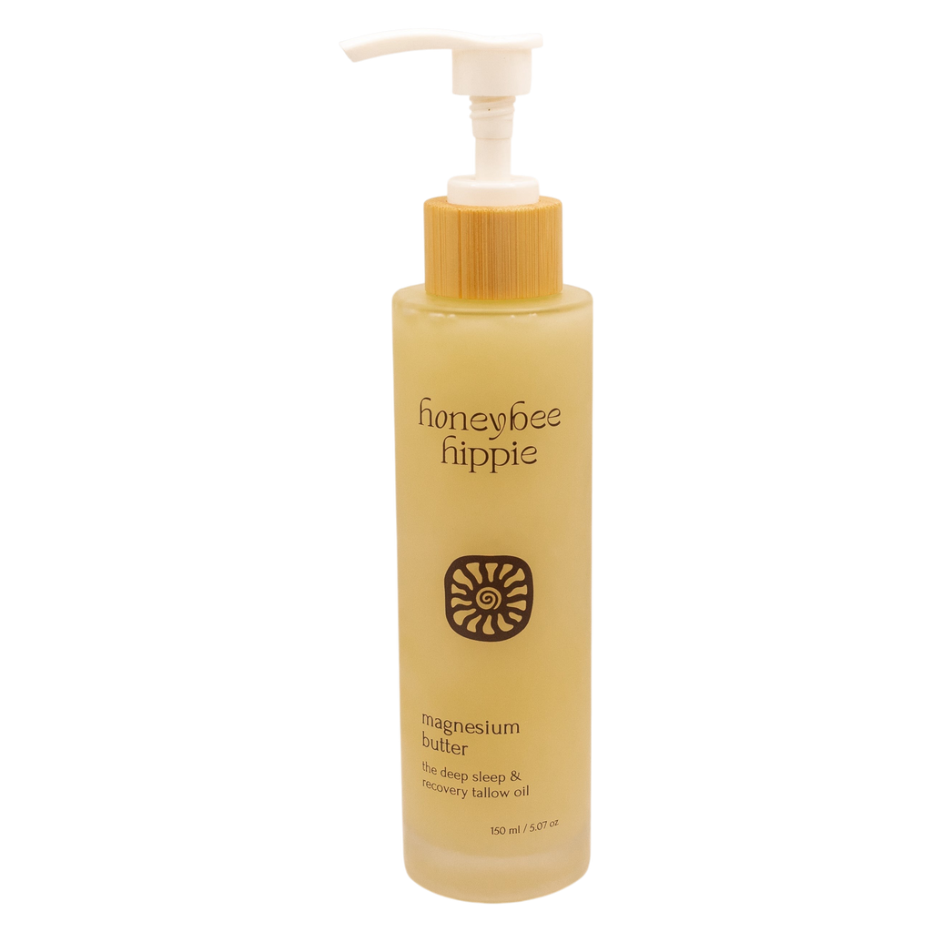 A 150 ml bottle of Honeybee Hippie magnesium butter with a pump, featuring a sun label and containing magnesium chloride for deep sleep and recovery.