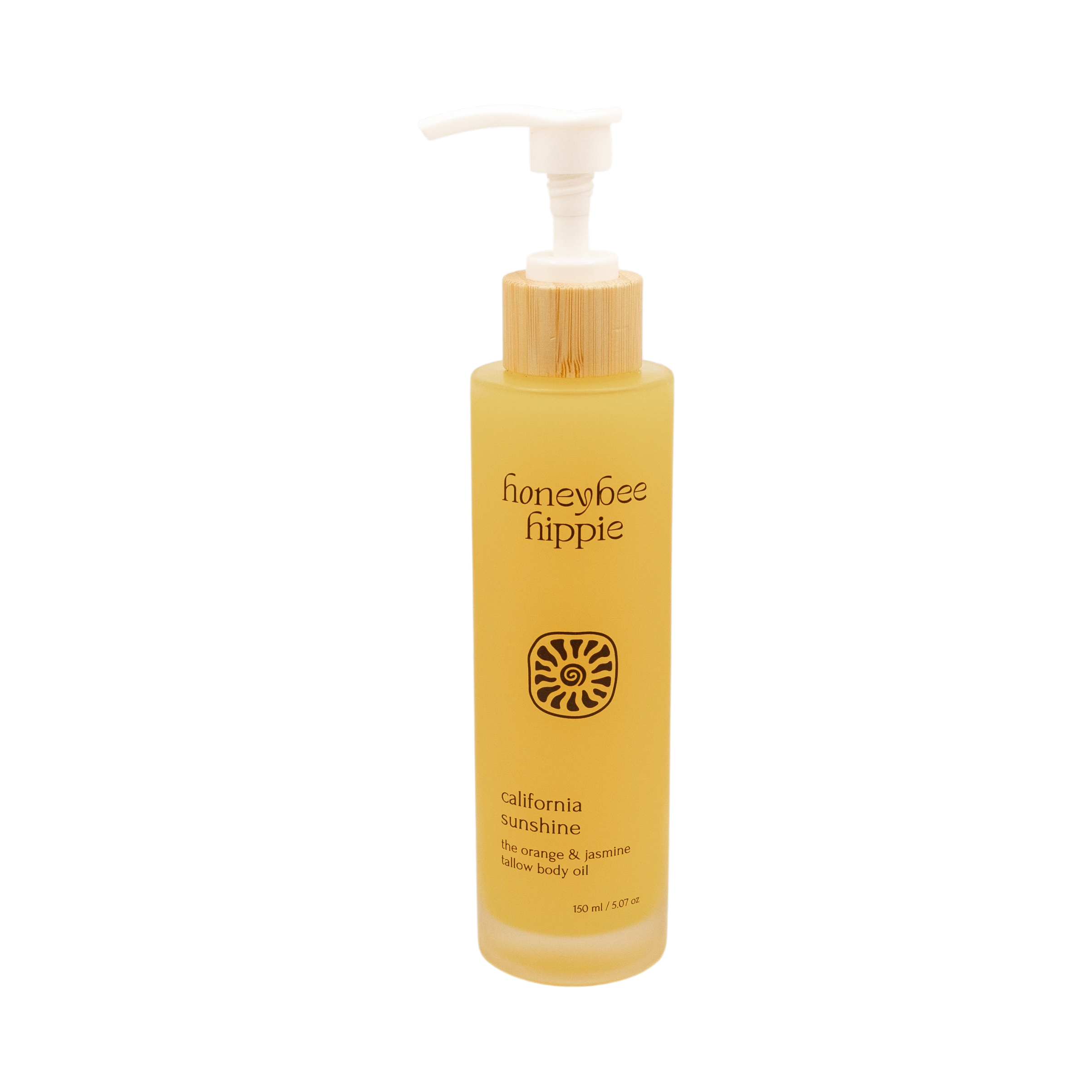 A 150 ml yellow bottle of Honeybee Hippie California Sunshine skin nourishing oil with a white pump, bamboo accent, and label featuring blue orange & jasmine, grass-fed suet tallow, and organic jojoba oil.