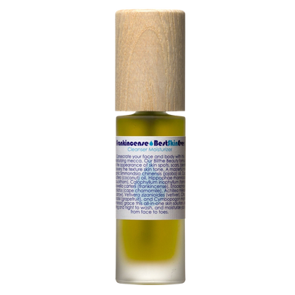 A small cylindrical bottle of Best Skin Ever Cleanser - Frankincense by Living Libations, featuring a wooden cap and a transparent body showing a yellow liquid inside. Infused with Frankincense Oil, the label reads "frankincense Best Skin Ever" with instructions and ingredients listed in smaller text.