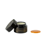 An open jar of Wild Mamas Ancestral Blue 2.4oz Wild Bison Tallow Balm exposes its rich cream, while a golden balm rests nearby—ideal for soothing rosacea and supporting skin barrier repair.