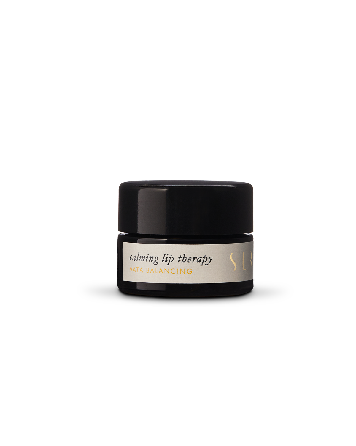 A small black jar of Surya's Calming Lip Therapy rests on a plain white background, featuring an organic lip balm crafted for soothing comfort.