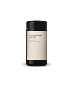 A black jar with a cream label reads "Energizing Digestive Spices" and "Surya" in gold—an ideal Ayurvedic blend for cooking or as a condiment, displayed against a white background.