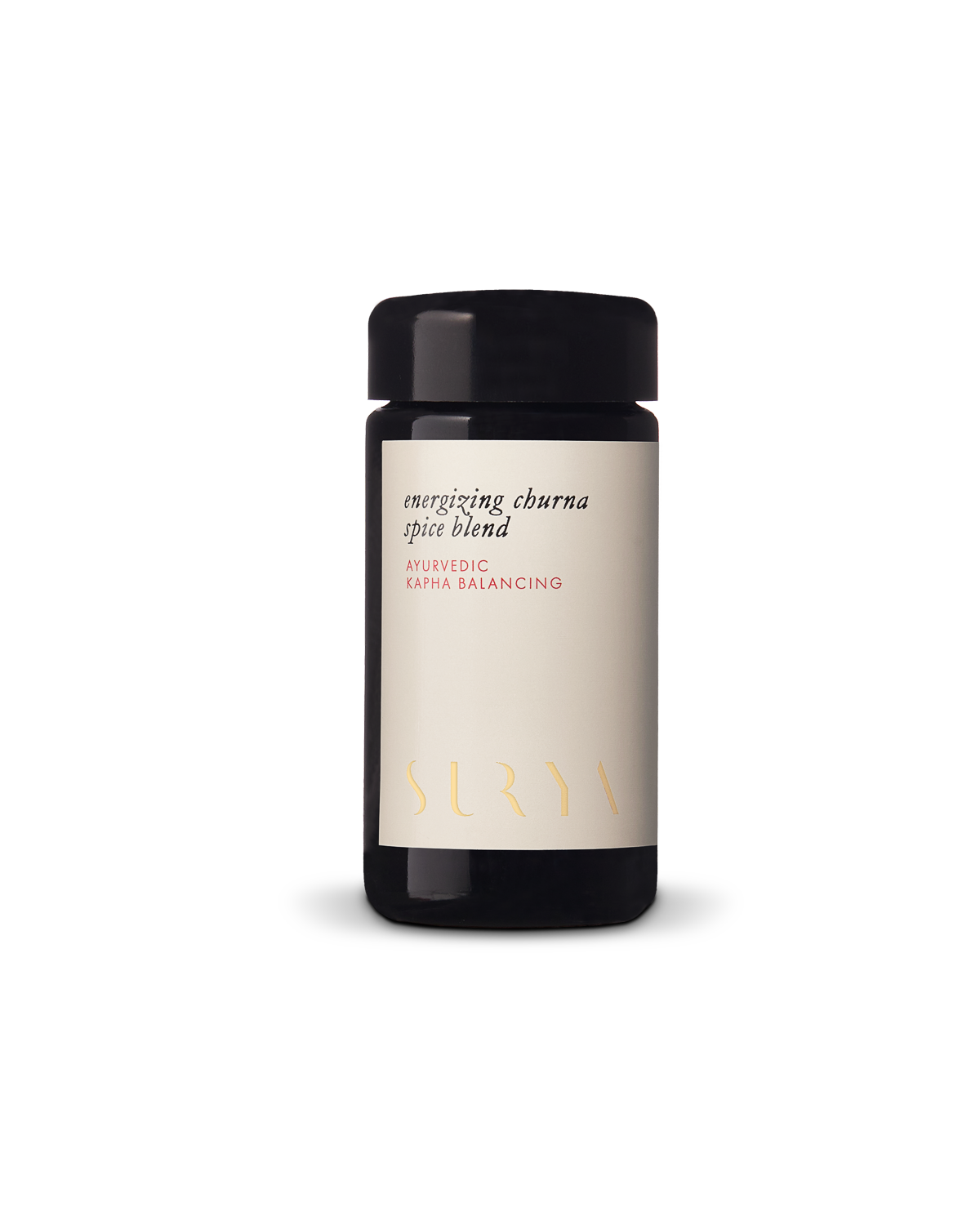 A black jar with a cream label reads "Energizing Digestive Spices" and "Surya" in gold—an ideal Ayurvedic blend for cooking or as a condiment, displayed against a white background.