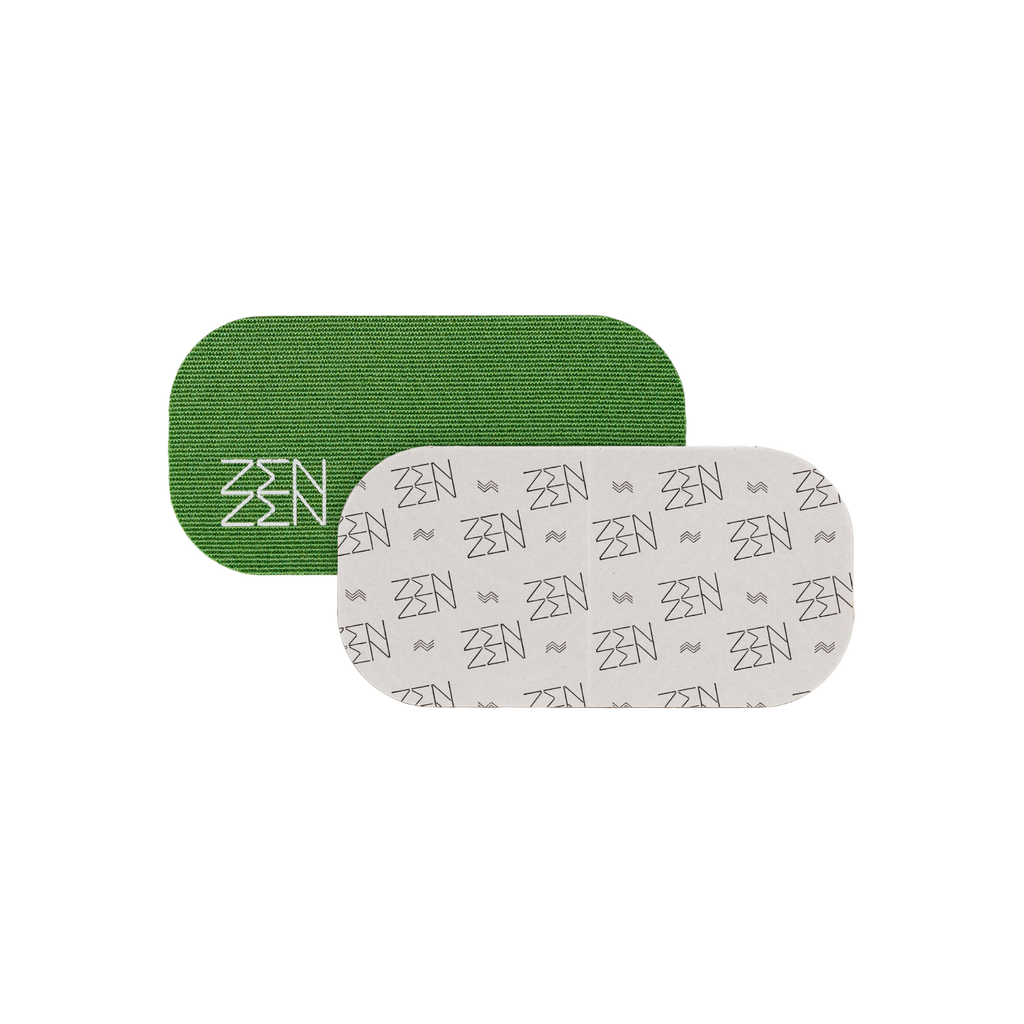 Evergreen Mouthtape by Zenzentape features two rectangular patches with rounded edges—one green with a white zigzag "ZEN" pattern, the other white with a gray "ZEN" design—ideal for nasal breathing and snoring prevention.