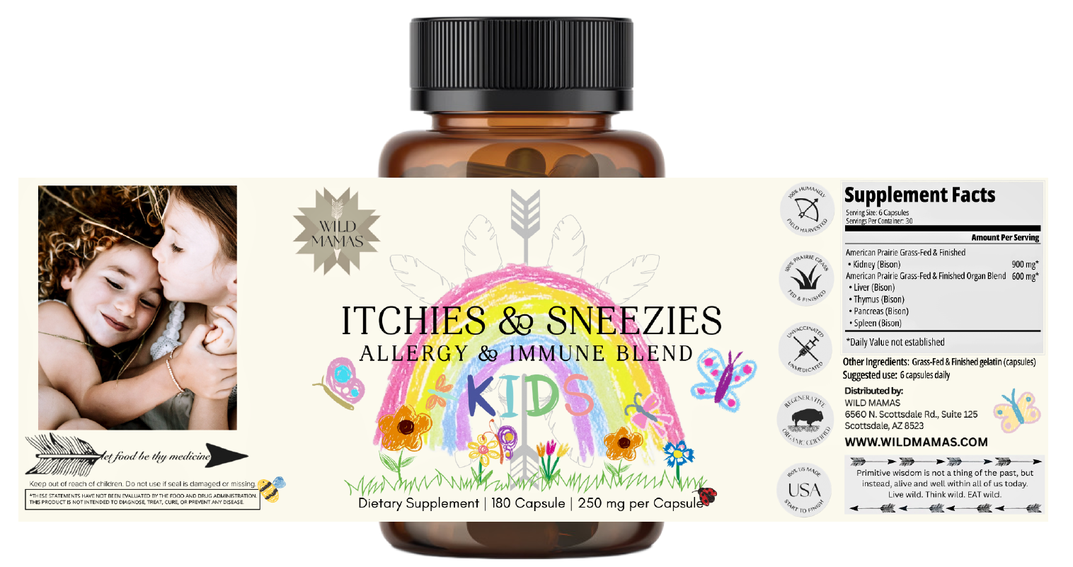 A brown supplement bottle labeled "Itchies & Sneezies - Allergy & Immune Blend KIDS" by Wild Mamas features children's rainbow, flowers, and butterflies artwork, whole-food nutrition highlights, supplement facts, and a child-parent photo.