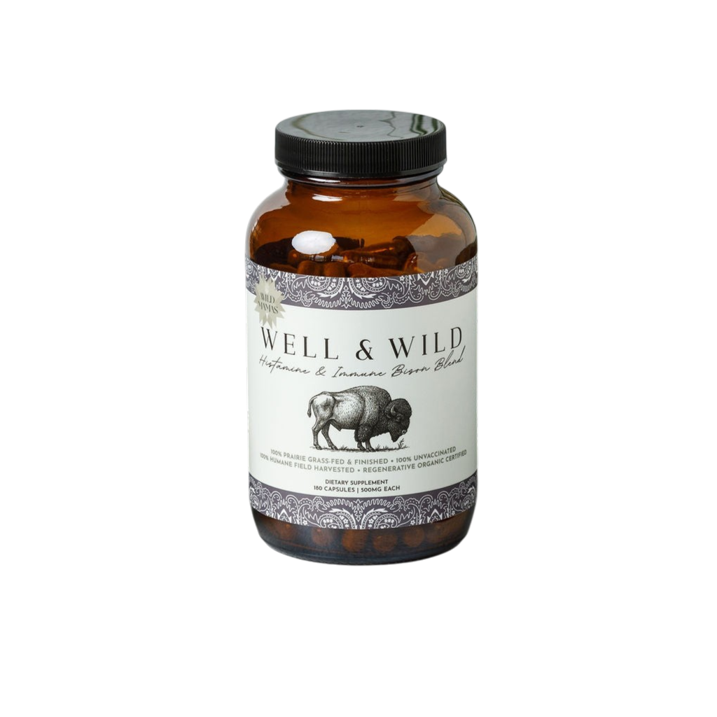 A brown glass jar labeled "Wild Mamas Well and Wild- Histamine and Immune Bison Organ Blend" features a bison illustration. This grass-fed, organic blend is ideal for histamine intolerance and DAO enzyme support.