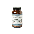A brown glass jar from Wild Mamas labeled "Wild Salmon Roe" with a fish illustration and blue border sits on a white background, holding bright orange freeze dried salmon roe rich in omega-3 fatty acids.