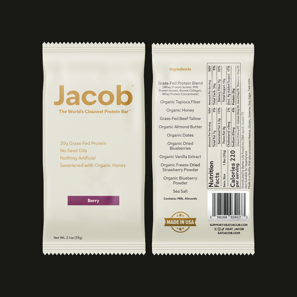Front and back of The Jacob Bar by Jacob in berry flavor. Packaging spotlights 20g grass-fed protein, no seed oils, nothing artificial, organic honey. Honey-sweetened bar with visible nutrition facts and ingredients.