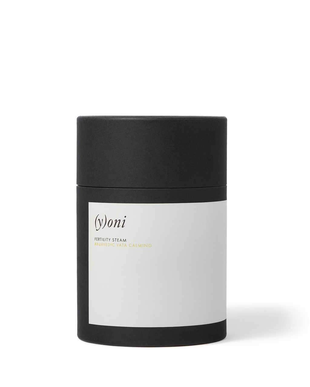 A black cylindrical container with a white label that reads "Surya (y)oni Fertility Steam" in minimalist font, featuring Ayurvedic herbs for yoni fertility steam, set against a plain white background.