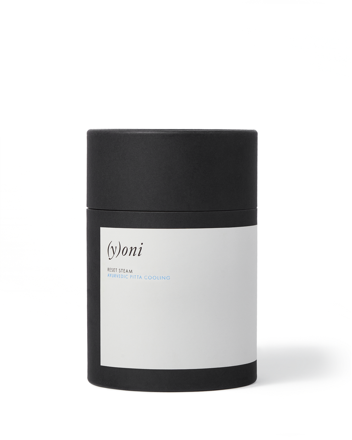 A cylindrical black container with a white label showing the Surya brand and "(y)oni Reset Steam Ayurvedic Pitta Cooling," featuring Ayurvedic herbs for reproductive health, set against a plain white background.