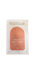 A white packet labeled "PLANTWALK" contains RIVERBANK | Lymphatic Clarity Herbal Infusion. Earthy-toned packaging notes 2.3 oz, 65g, and 10 sachets at the bottom.
