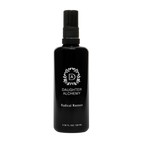 A black spray bottle labeled "Daughter Alchemy Radical Restore® Botanical Energizing Spray" with a white wreath logo, containing 3.38 fl oz (100 ml), is set against a plain white background.