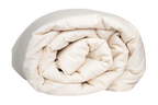 The Shepherd's Dream Summer Weight Wool Comforter, in a cream color, is neatly rolled and displayed against a plain white background.