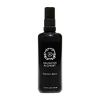 A black spray bottle labeled "Daughter Alchemy Supreme Space® Botanical Protective Spray" with a white logo and text, containing 3.38 fl oz (100 ml), stands upright on a plain white background.