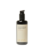 A dark pump bottle labeled "Rose Petal Body Oil" by Surya, featuring handmade skincare with rose essential oil, set against a plain white background.