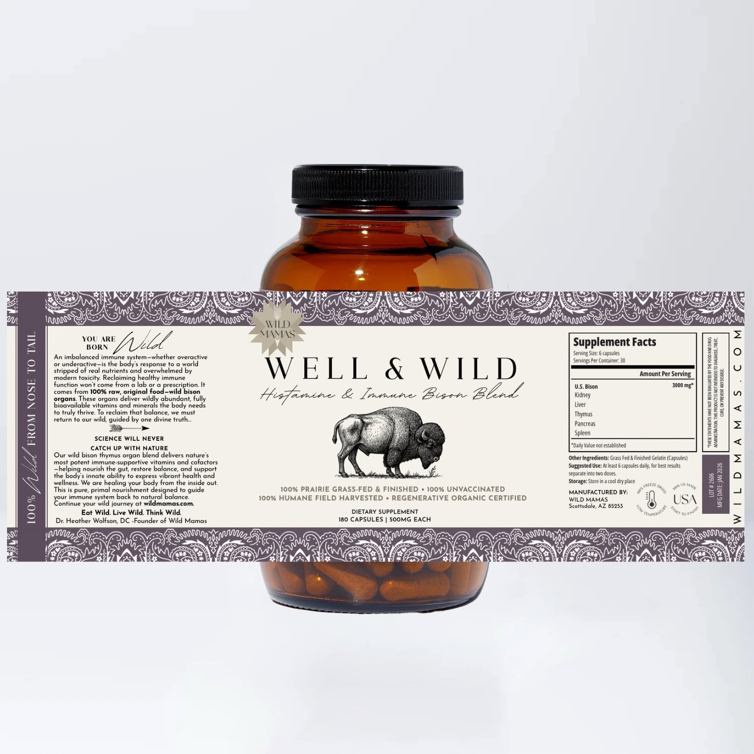 Amber glass bottle with a detailed “Well & Wild- Histamine and Immune Bison Organ Blend” label by Wild Mamas, featuring a bison illustration, supplement facts, and info on wild-sourced nutrition.