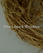 Close-up of natural fibers evokes fine lines and wrinkles, with "Fine Lines & Wrinkles" overlaid—hinting at how Summer Solace Tallow's Emanations Profound Face Oil, with tallow, emu oil, and florals, deeply nourishes and restores delicate skin.