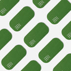 A repeating pattern of green, rounded rectangles on white, each with a white zigzag in one corner—reflecting the organic elegance of bamboo silk and Zenzen Tape motifs—adorns Zenzentape’s Evergreen Mouthtape.