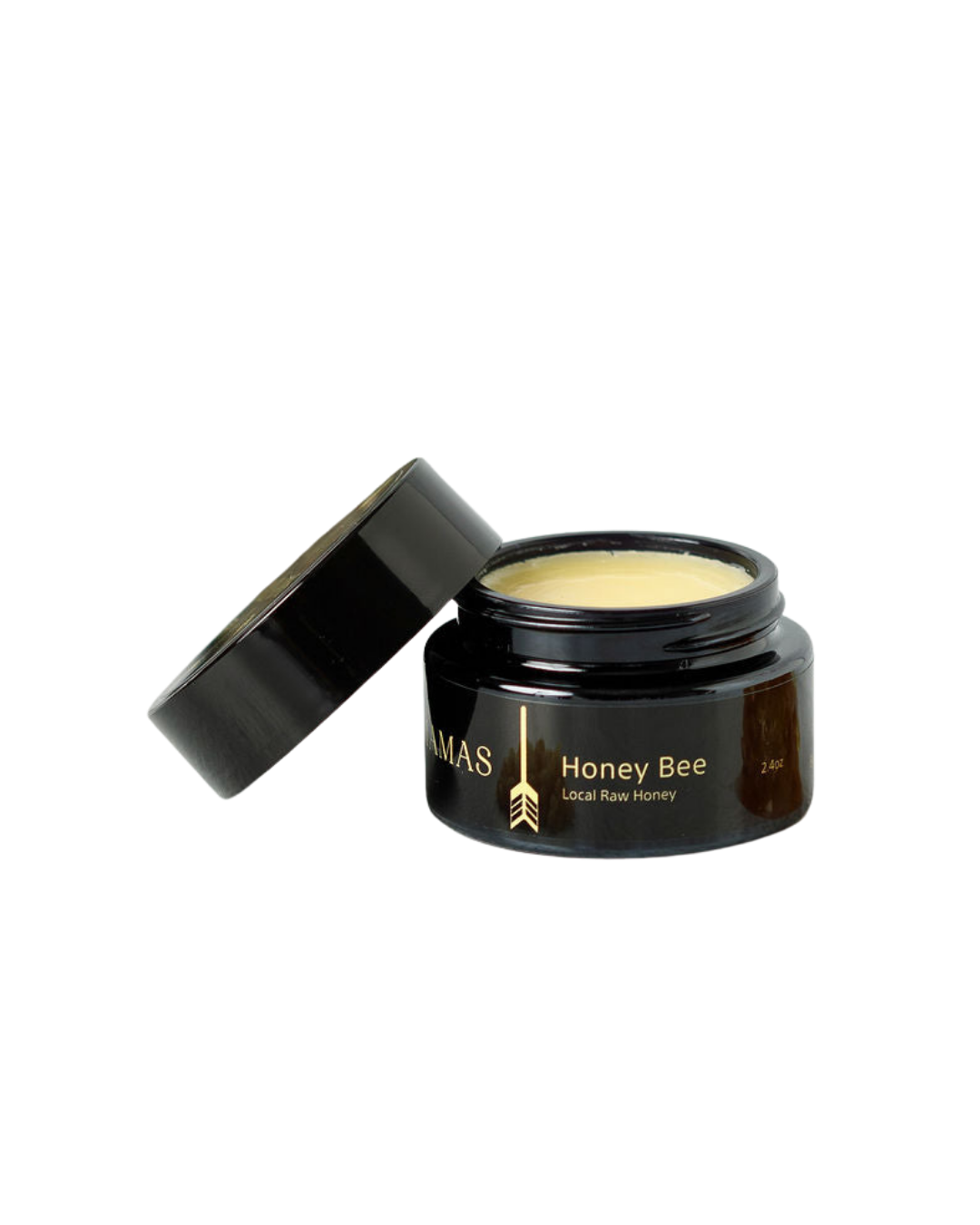 A dark brown jar labeled "Honey Bee (Raw Honey)- Wild Bison Tallow Balm" by Wild Mamas, with a slightly open black lid revealing creamy balm inside for deep hydration and skin barrier repair, set against a plain white background.
