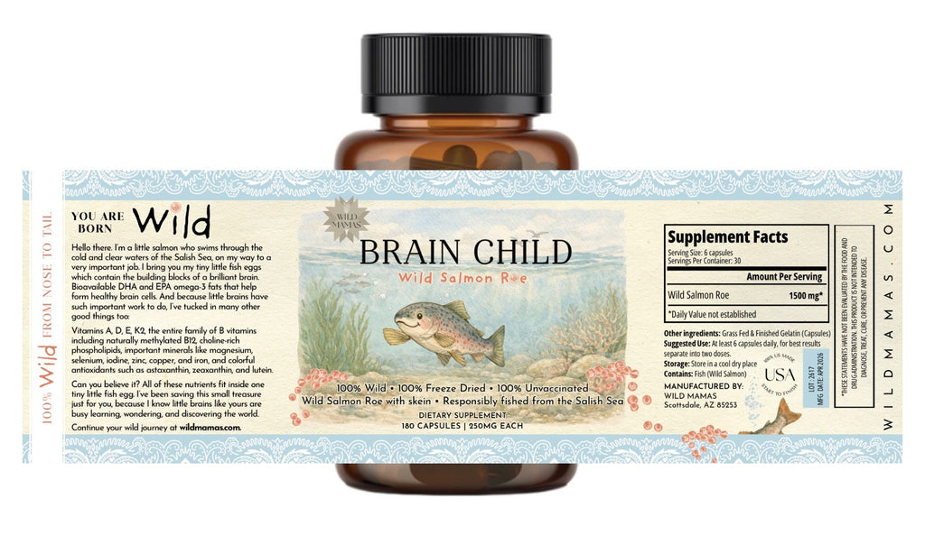 A brown bottle with a colorful label reading "Brain Child" by Wild Mamas, featuring a salmon leaping from water. The label highlights wild salmon roe as an ideal baby first food, plus supplement facts and product benefits.
