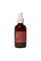 A brown glass pump bottle labeled "Mountain Song Body and Hair Oil – Petrichor, Gardenia, Honeysuckle (Limited Edition)" by Summer Solace Tallow, featuring a pink label, set against a plain white background.