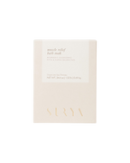 Minimalist beige and white box labeled "Muscle Relief Bath Soak" by Surya, featuring arnica montana for anti-inflammatory support, Ayurvedic doshic balancing, single-use spa therapy, and net weight 24.4 oz (0.69 kg).