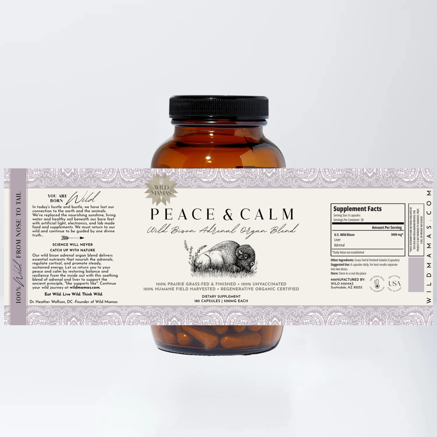 Amber bottle of Wild Mamas Peace and Calm—Wild Bison Adrenal Organ Blend supplements with a cream and lavender label showing product info and supplement facts, set against a plain white background.