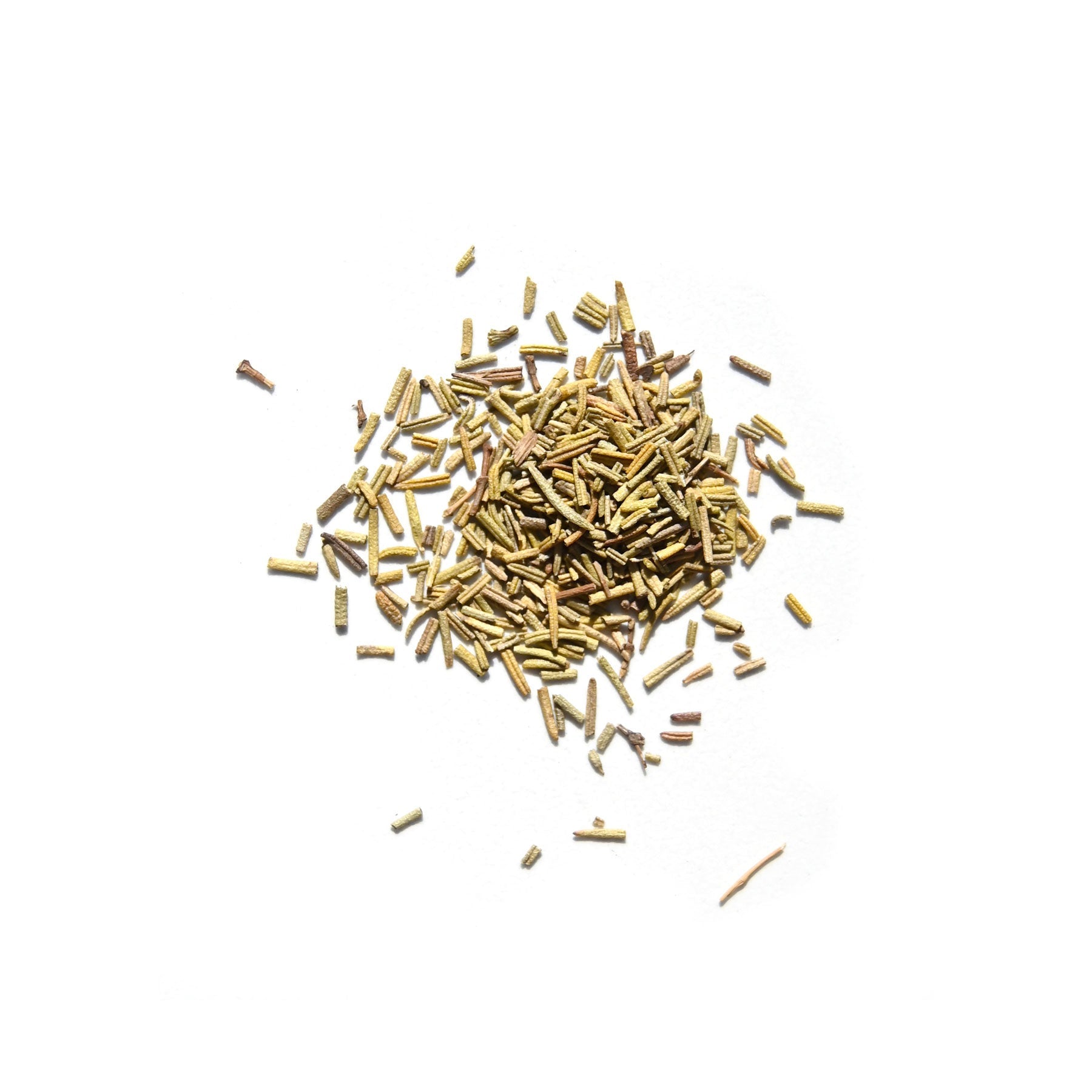 A small pile of thin, needle-like dried rosemary leaves scattered on a white background—these are often used in Daughter Alchemy’s Radical Restore® Botanical Energizing Spray for their mood-boosting properties.