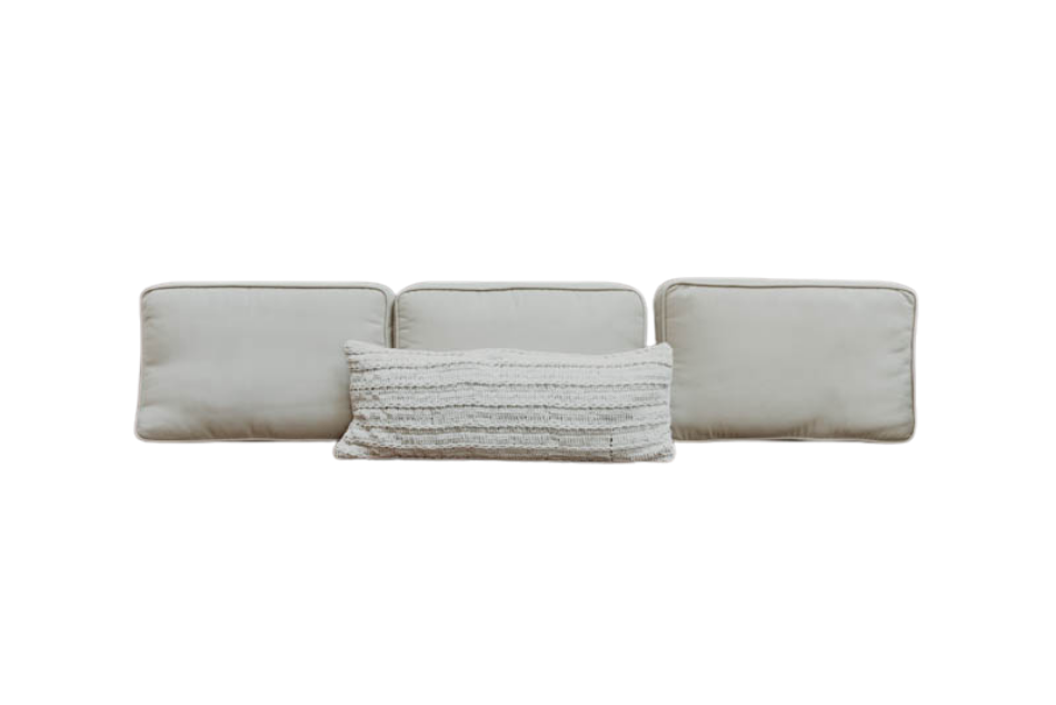 Three plain, square, light beige EcoWool pillows are arranged in a row, with a smaller, textured Shepherd's Dream Wool Lumbar Pillow in front. The background is white.