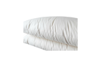 The Ashland Organic Wool Pillows from Shepherd's Dream are stacked on top of each other against a transparent background. These natural sleep pillows, with their fluffy white appearance, look soft and inviting while featuring neatly aligned seams and a smooth texture.