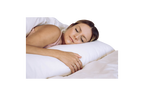 A person peacefully sleeping on the Shepherd's Dream Wool Filled Body Pillow with an organic cotton cover, nestled under a white blanket. Their face is relaxed and they are lying on their side, with a hand resting softly on the wool-filled pillow.