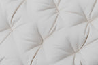 Close-up of a tufted Snuggle Mate Wool Topper by Shepherd's Dream, featuring EcoWool® fabric with soft folds in a light hue, creating a textured and detailed surface.