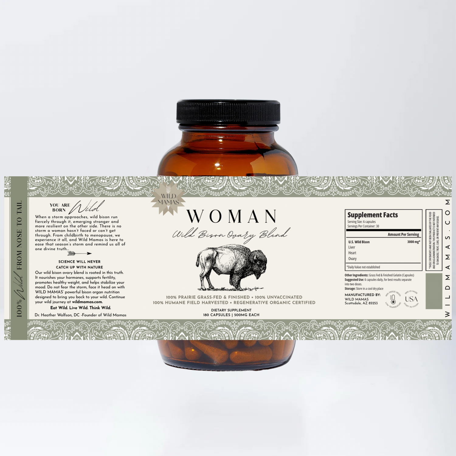 A brown glass bottle labeled "Woman – Wild Bison Ovary Blend" by Wild Mamas features a bison illustration, cream label with ancestral nutrition facts, green borders, and contains organ meat supplements.