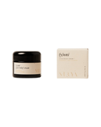 A small jar of Surya (y)oni Cycle Relief Cream, an Ayurvedic formula for menstrual relief, sits beside its matching beige box with minimalist black text on a white background.